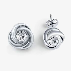 Ohrstecker aus Silber mit Knoten-Design und glänzendem Kristall in der Mitte